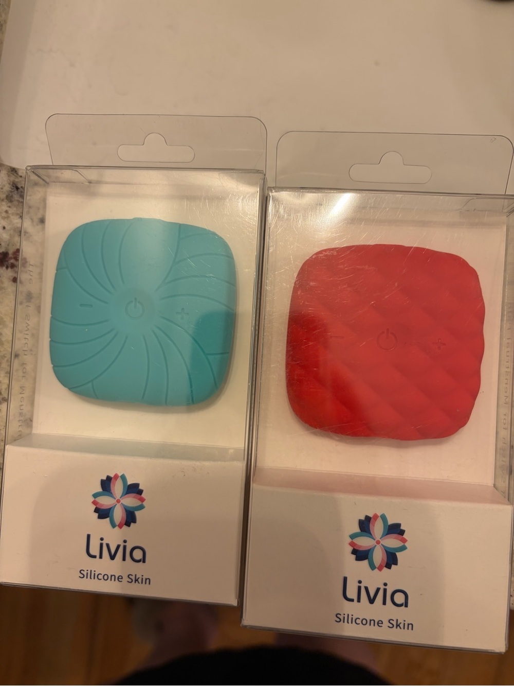 Livia Silicone Skin Pain Relief Device - Teal & Red (Pair)